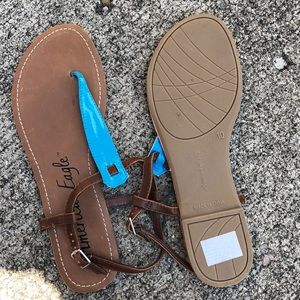Sandals with a teal strap